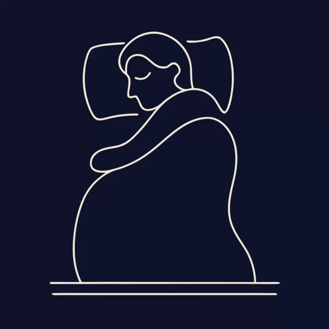 A person tucked into bed, resting peacefully on the pillow.